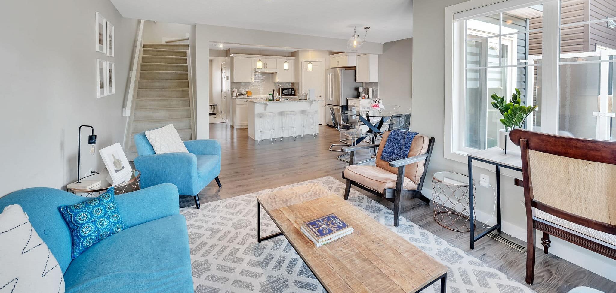 Modern living room with kitchen view